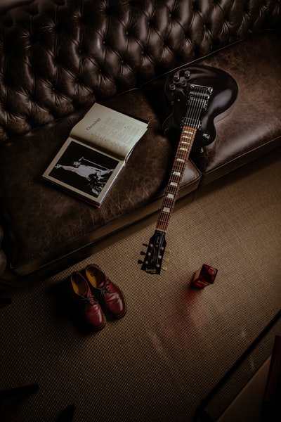 Black and white book beside the strat black and white
